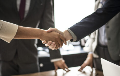 Business people shaking hands in a meeting room
